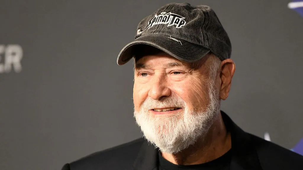 Getty Images Hollywood actor and director Rob Reiner wearing a black cap and black jacket.