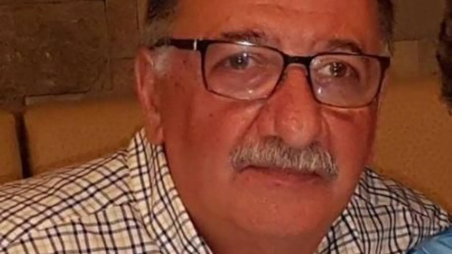 Social media Tibor Weitzen close up wearing glasses